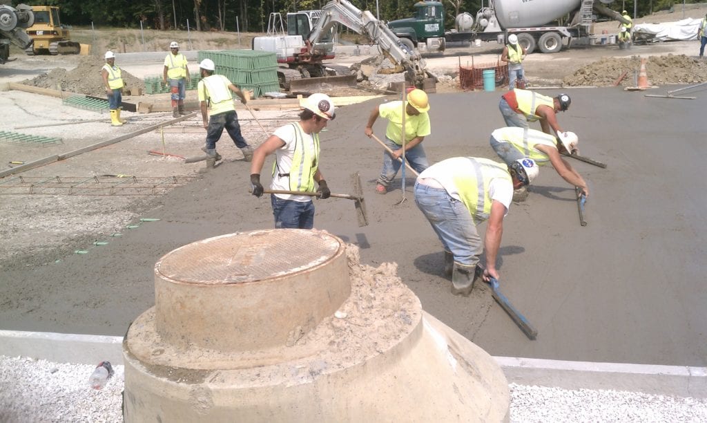 Concrete contractor Dayton, Toledo, Cleveland, Columbus Ohio, Pennsylvania, West Virginia we can save you time and money with our newest technology laser screed and riding power trowels.