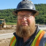 Daniel Yoder, founder and owner of Yoder Laser Concrete, on a commercial jobsite