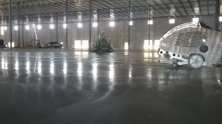 Finished warehouse concrete floor with a reflective troweled surface